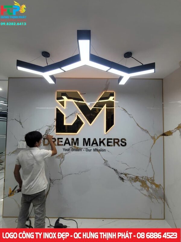 Logo inox vang guong