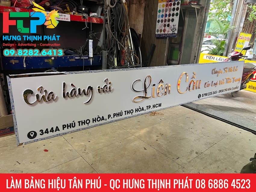 bang hieu cua hang vai lien cau tan phu