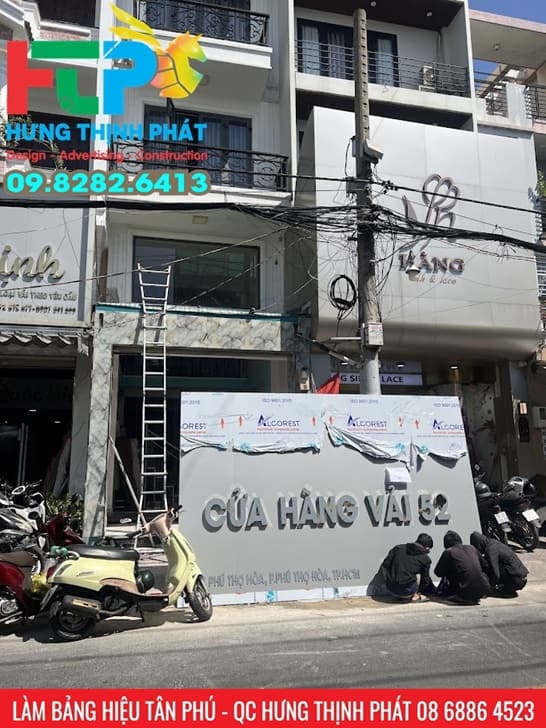 Lam bang hieu cua hang vai 52 tai tan phu